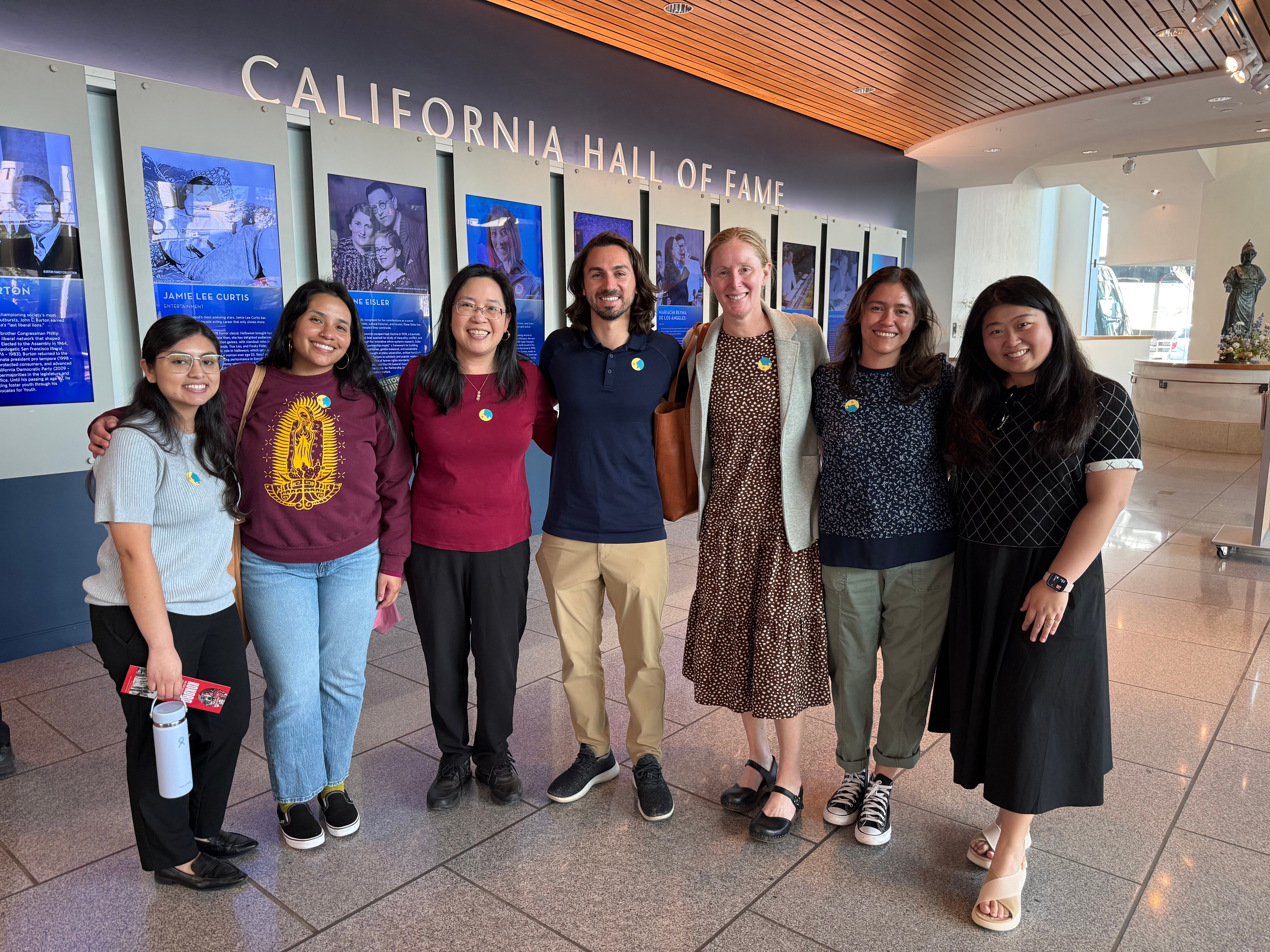 As part of the IMPACCT program, students and residents visit the California Museum's exhibit on displacement of Sacramento's Japanese American community during WWII 