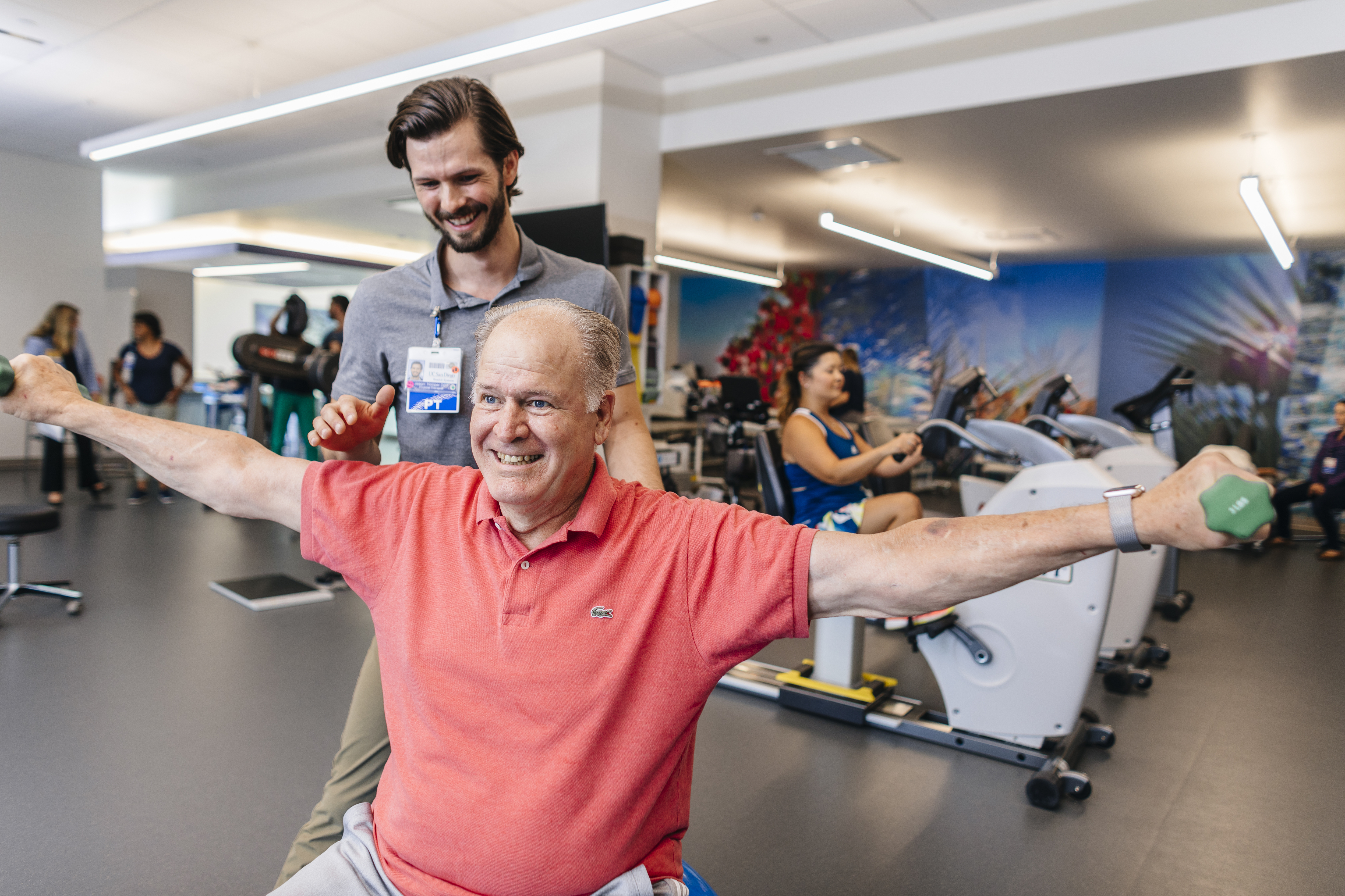 provider and patient in gym setting