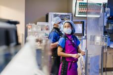 UCH medical professionals preparing for a procedure in the catheterization lab.