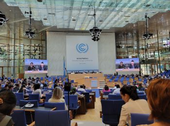 Photo of meeting room and attendees at UN Climate Conference SB58 in Bonn