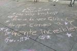 Photo of sidewalk chalk art from children at emergency intake sites in Southern California in spring of 2021