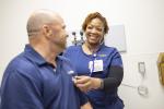 image of a health care professional using a stethoscope on a patient's heart