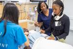  UC Davis Health nurses volunteered to lead SHINES participants through hands-on simulations with mannikins.