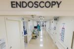 Hallway in hospital with Endoscopy written above doorway
