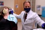 Dr. Gaskill scanning Kelsey Kelley’s neck