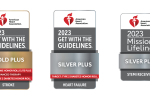 Three gray and white badges with a red heart at the top each 