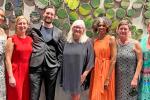 Heather Young, center, stands flanked by fellows from inaugural cohort