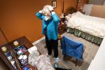 Nursing Professor Terri Harvath dons a wig for a simulation to provide nursing students will real-life scenarios.