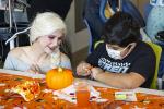 Child wearing mask with Elsa from Frozen