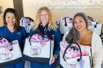 Group shot of three women with totes