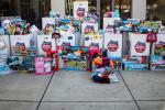 Photo of toys in bins in front of the Comprehensive Cancer Center