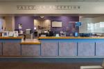 Reception desk with sign overhead saying Vascular Reception 