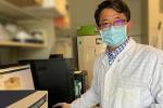 Aijun Wang in his lab