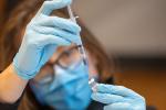 health care provider with syringe 