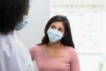 Female patient speaking with a female doctor
