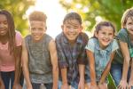 Group of diverse children in a row 