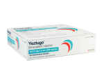Lenacapavir vaccination drug syringe in yellow gloved hand.