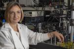 Professor Laura Marcu sitting in a lab 