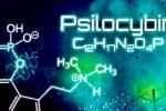 The word “Psilocybin” and its chemical composition are displayed in white against a dark background.