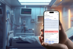 A hand holding a smartphone with an ECG report, inside a hospital room with medical monitors and a patient bed in the background.