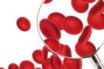 Red blood cells and a magnifying glass