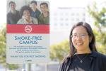 Elisa Tong next to stop tobacco sign