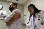 student with simulation patient