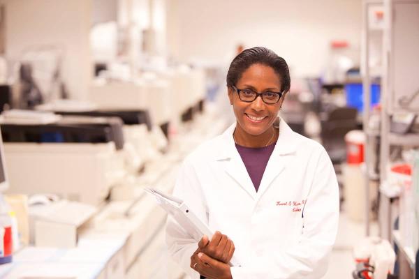 Researcher in white coat