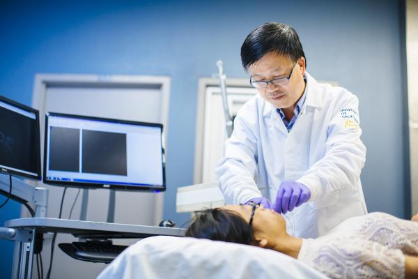 provider in white coat delivering care