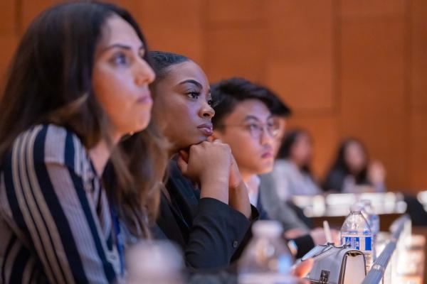 group of students looking at a screen