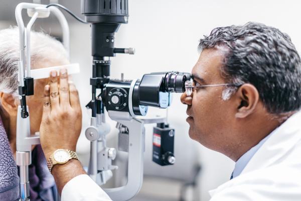 physician conducting an eye exam