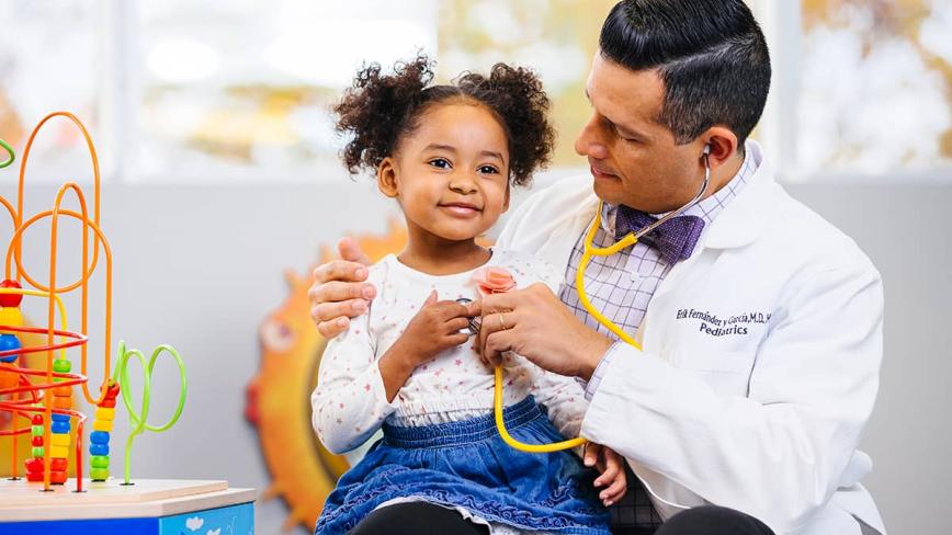 Pediatric doctor with patient