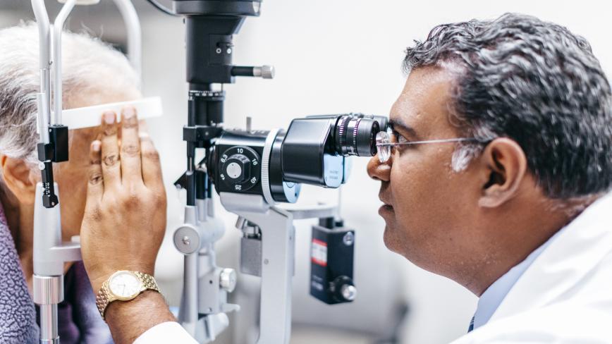 physician conducting an eye exam