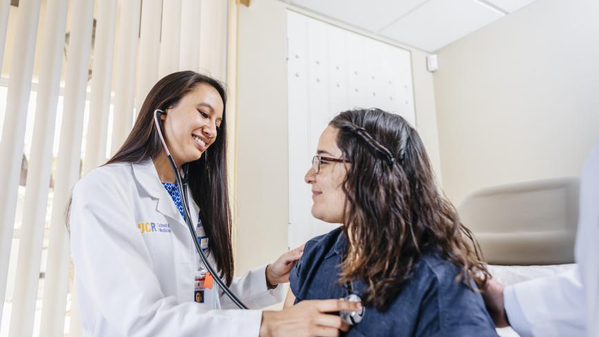 A health care professional providing care to a patient