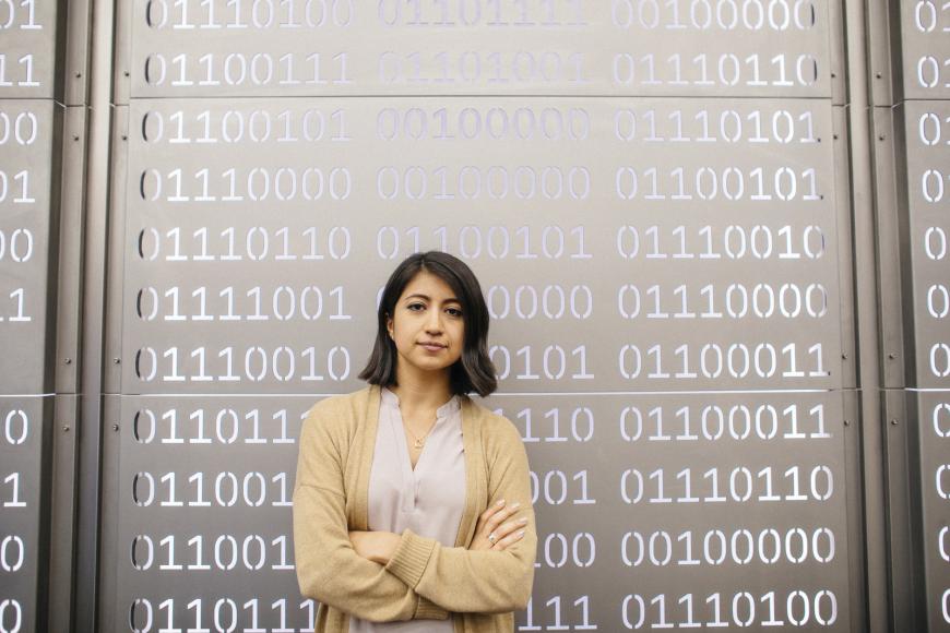 Girl with data points behind her